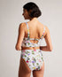 ROSABY-Swimwear-Flirty and little retro, the ROSABY bikini bottom is the ideal swimwear addition to your summer wardrobe. It's made with a soft stretch fabric and features contouring details along the front to flatter your shape. Wear it with the matching top to create a look that's perfect for lounging poolside.The fabric of this product is made with 78% recycled polyamide. Using recycled polyamide helps divert plastic waste from ending in landfills. Bikini bottoms Scattered bouquet print High waisted Cont